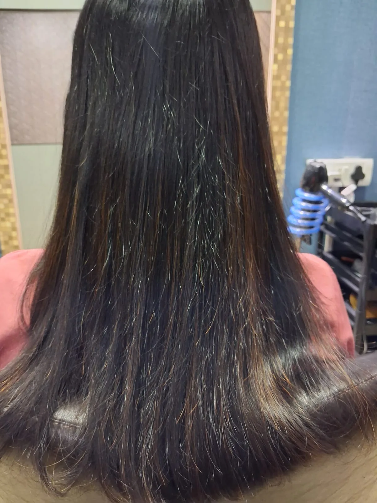 Smooth glossy finished hair result at Studio Salvador hair salon in Salt Lake Kolkata
